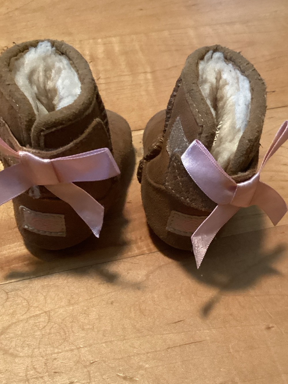 Ugg Baby Faux-Shearling Booties with Pink Bow - Brown